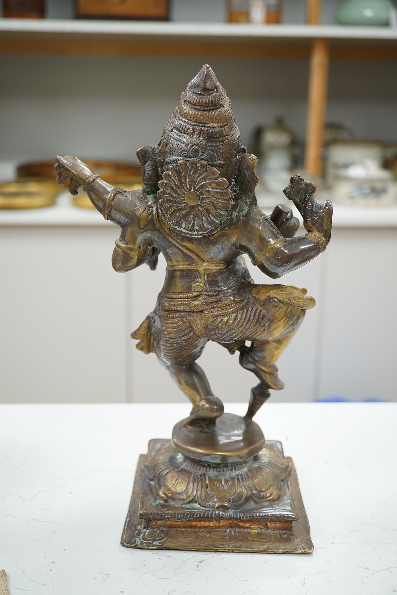 A gilt bronze statue of Ganesh, 30cm high. Condition - fair to good, general wear to the surface